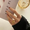 Close-up of gold knuckle rings set
