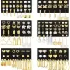 Assortment of gold stud earrings